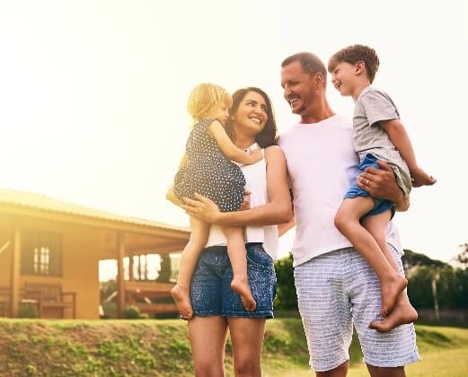 Mother and father holding their childrens image